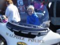 sitting_on_police_bike_at_next_generation_childrens_centers_walpole_ma-600x450