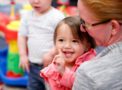 smiling_preschool_girl_and_teacher_cadence_academy_romeoville_il-609x450