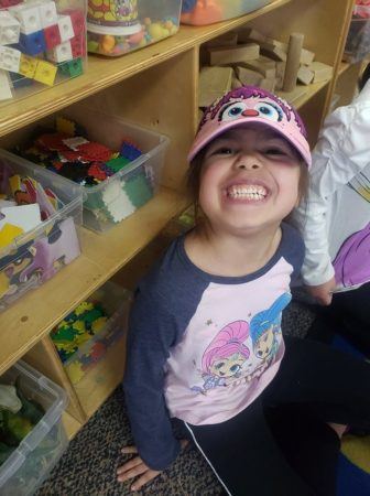 smiling_preschool_girl_cadence_academy_preschool_san_antonio_tx-336x450