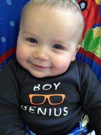 smiling_toddler_boy_genius_cadence_academy_preschool_grand_west_des_moines_ia-338x450