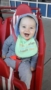 smiling_toddler_boy_sitting_in_stroller_prime_time_early_learning_centers_farmingdale_ny-253x450