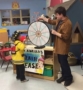 spinning_mr_adrians_wheel_at_cadence_academy_preschool_ken_caryl_littleton_co-417x450