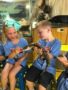 summer_camp_children_enjoying_animal_presentation_cadence_academy_preschool_chesterfield_hilltown_mo-340x450