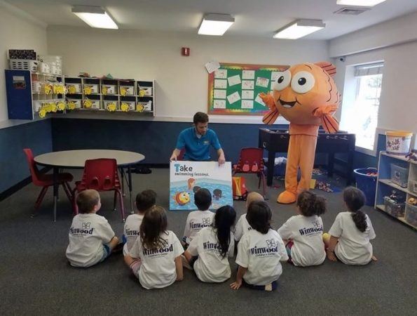 swimming_presentation-with_goldfish_character_winwood_childrens_center_fairfax_va-595x450