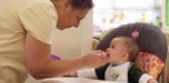 teacher_feeding_infant_at_cadence_academy_preschool_ridgefield_ct-752x372