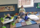 teacher_reading_book_to_toddlers_winwood_childrens_center_fairfax_va-657x450