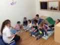 teacher_reading_to_2-year-olds_cadence_academy_preschool_austin_cedar_park_tx-607x450