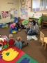 teacher_reading_to_toddlers_rogys_learning_place_morton_il-338x450