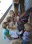 teacher_showing_preschool_kids_worms_at_cadence_academy_preschool_ken_caryl_littleton_co-336x450