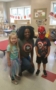 teacher_with_spiderman_and_supergirl_at_cadence_academy_raintree_charlotte_nc-279x450