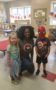 teacher_with_spiderman_and_supergirl_at_cadence_academy_raintree_charlotte_nc-279x450