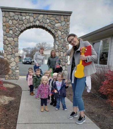 teachers_and_2-year-olds_taking_a_walk_miss_muffets_learning_center_klamath_falls_or-393x450