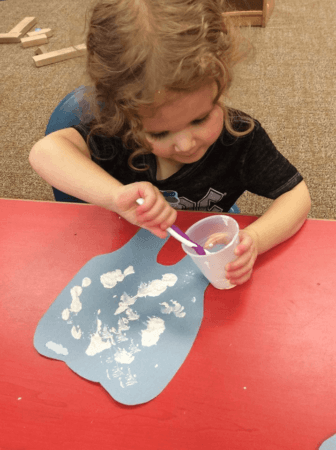 teeth_brushing_activity_cadence_academy_preschool_greensboro_nc-336x450