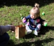 toddler collecting eggs at Cadence Academy Preschool and Daycare Yelm Highway in Olympia, Washington