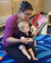 toddler_and_teacher_reading_book_cadence_academy_preschool_johnston_ia-359x450