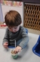 toddler_boy_eating_a_snack_prime_time_early_learning_centers_middletown_ny-292x450