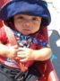 toddler_boy_on_bye-bye_buggie_cadence_academy_preschool_johnston_ia-336x450