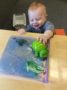 toddler_boy_playing_with_turtle_next_generation_childrens_centers_hopkinton_ma-333x450