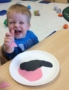 toddler_enjoying_art_project_at_phoenix_childrens_academy_private_preschool_happy_valley-347x450