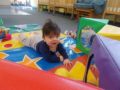 toddler_enjoying_tummy_time_creative_kids_childcare_centers_yorktown-600x450