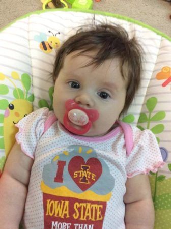 toddler_girl_lounging_cadence_academy_preschool_johnston_ia-336x450