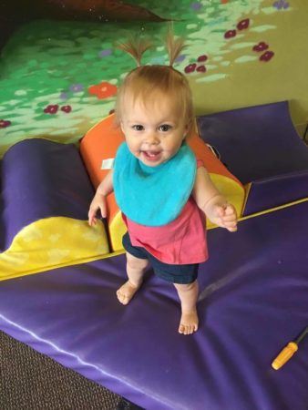 toddler_girl_playing_on_indoor_gym_cadence_academy_preschool_milwaukie_portland_or-338x450