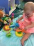 toddler_girl_playing_with_hammer_and_shovel_growing_kids_academy_fredericksburg_va-333x450