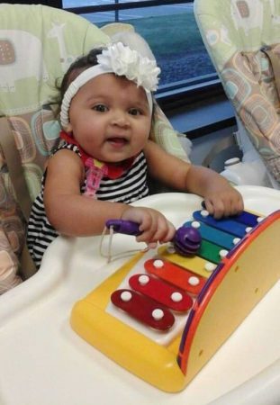 toddler_girl_playing_xylophone_prime_time_early_learning_centers_paramus_nj-311x450