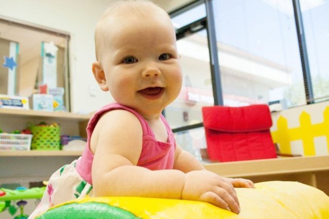 toddler_girl_smiling_at_cadence_academy_preschool_prairie_city_folsom_ca-675x450