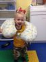 toddler_havin_fun_with_a_cushion_creative_kids_childcare_centers_kent-338x450