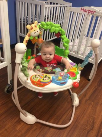 toddler_in_bouncer_at_faith_preschool_academy_olive_branch_ms-338x450