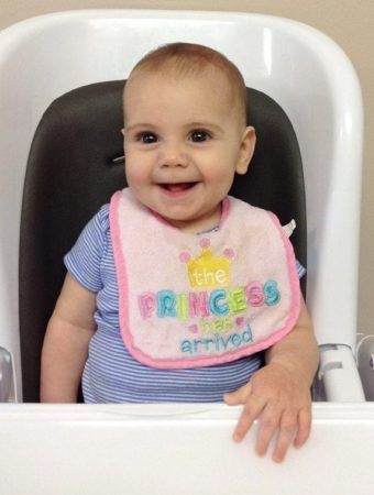 toddler_in_high_chair_at_cadence_academy_ballantyne_charlotte_nc-340x450