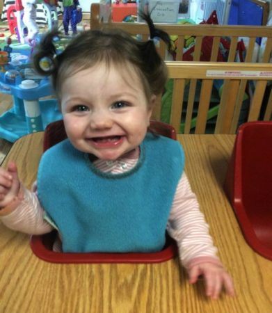 toddler_in_seat_cadence_academy_preschool_east_greenwich_ri-391x450