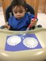 toddler_painting_around_doilies_cadence_academy_preschool_montgomery_il-336x450