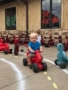 toddler_participating_in_st_jude_trike-a-thon_bearfoot_lodge_private_school_wylie_tx-338x450