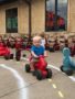 toddler_participating_in_st_jude_trike-a-thon_bearfoot_lodge_private_school_wylie_tx-338x450