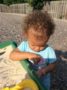 toddler_playing_with_sand_cadence_academy_northlake_charlotte_nc-336x450