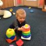 toddler_playing_with_stackable_rings_next_generation_childrens_centers_westford_ma-454x450