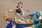 toddler_playing_with_toys_at_cadence_academy_preschool_rosemeade_carrollton_tx-686x450