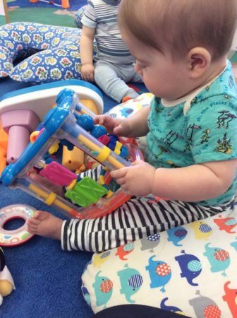 toddler_playing_with_toys_at_phoenix_childrens_academy_private_preschool_union_hills-336x450