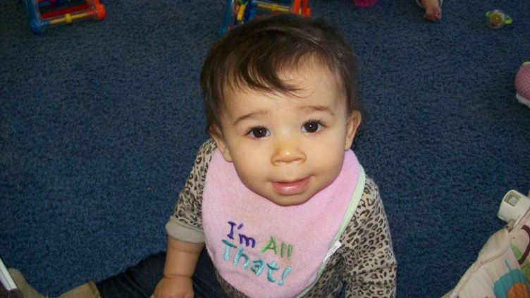 toddler_sitting_on_carpet_at_cadence_academy_preschool_lexington_sc-752x423