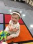 toddler_sitting_on_multi-colored_rug_jonis_child_care_preschool_burlington_ct-336x450