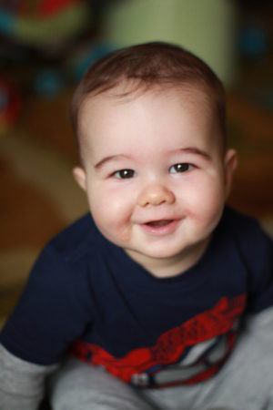 toddler_smiling_into_camera_carolina_kids_child_development_center_fort_mill_sc-300x450