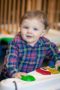 toddler_standing_at_activity_center_winwood_childrens_center_lansdowne_va-300x450