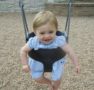 toddler_swinging_at_cadence_academy_preschool_columbine_littleton_co-468x450