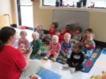 toddler_teacher_reading_book_at_cadence_academy_preschool_harbison_columbia_sc-600x450