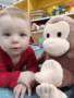 toddler_with_curious_george_jonis_child_care_preschool_farmington_ct-338x450