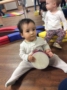 toddler_with_tambourine_cadence_academy_preschool_cypress_houston_tx-333x450