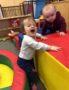 toddlers_climbing_in_padded_playing_area_cadence_academy_preschool_smithfield_ri-343x450