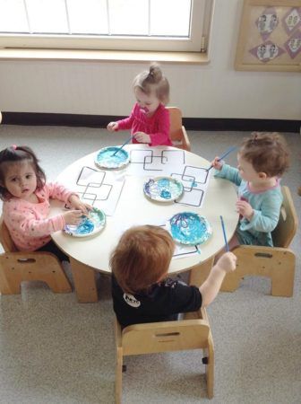 toddlers_doing_an_art_project_cadence_academy_preschool_dupont_wa-336x450